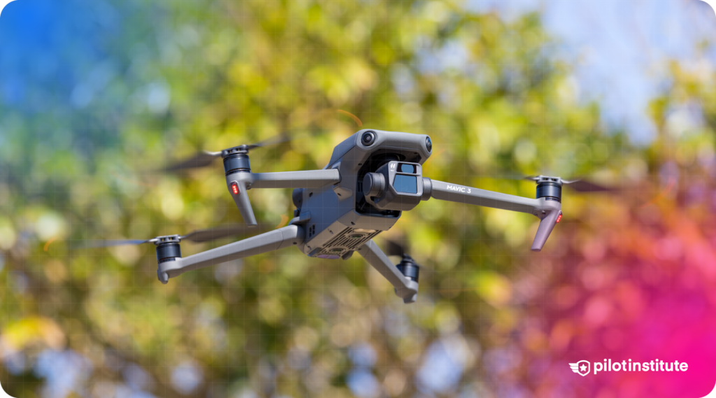 DJI Mavic 3 drone in flight outdoors with blurred green foliage background and subtle blue-pink gradient overlay, branded with Pilot Institute logo.